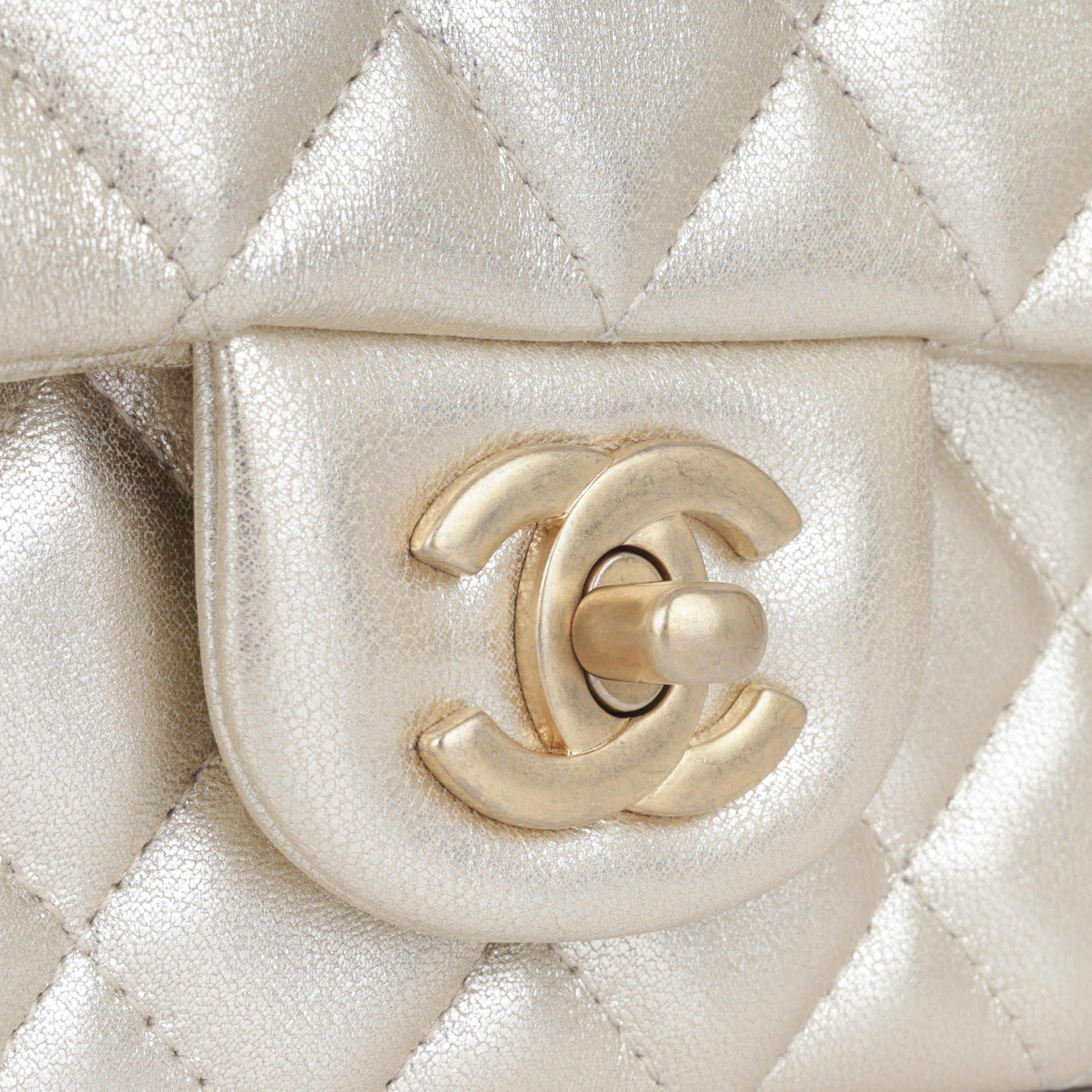 Chanel Classic Mini Flap - Metallic Champagne Lambskin GHW – Bagista