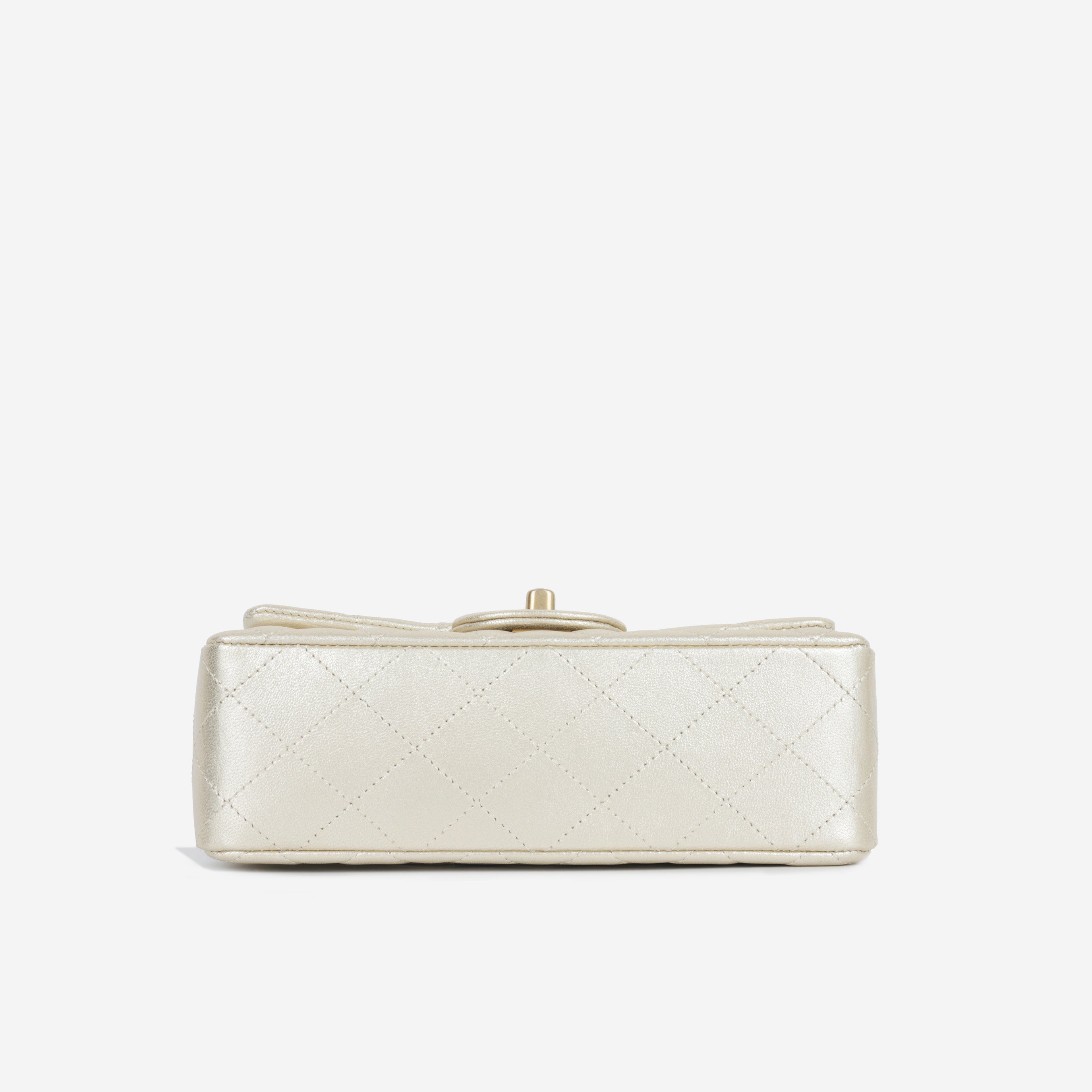 Chanel Classic Mini Flap - Metallic Champagne Lambskin GHW – Bagista