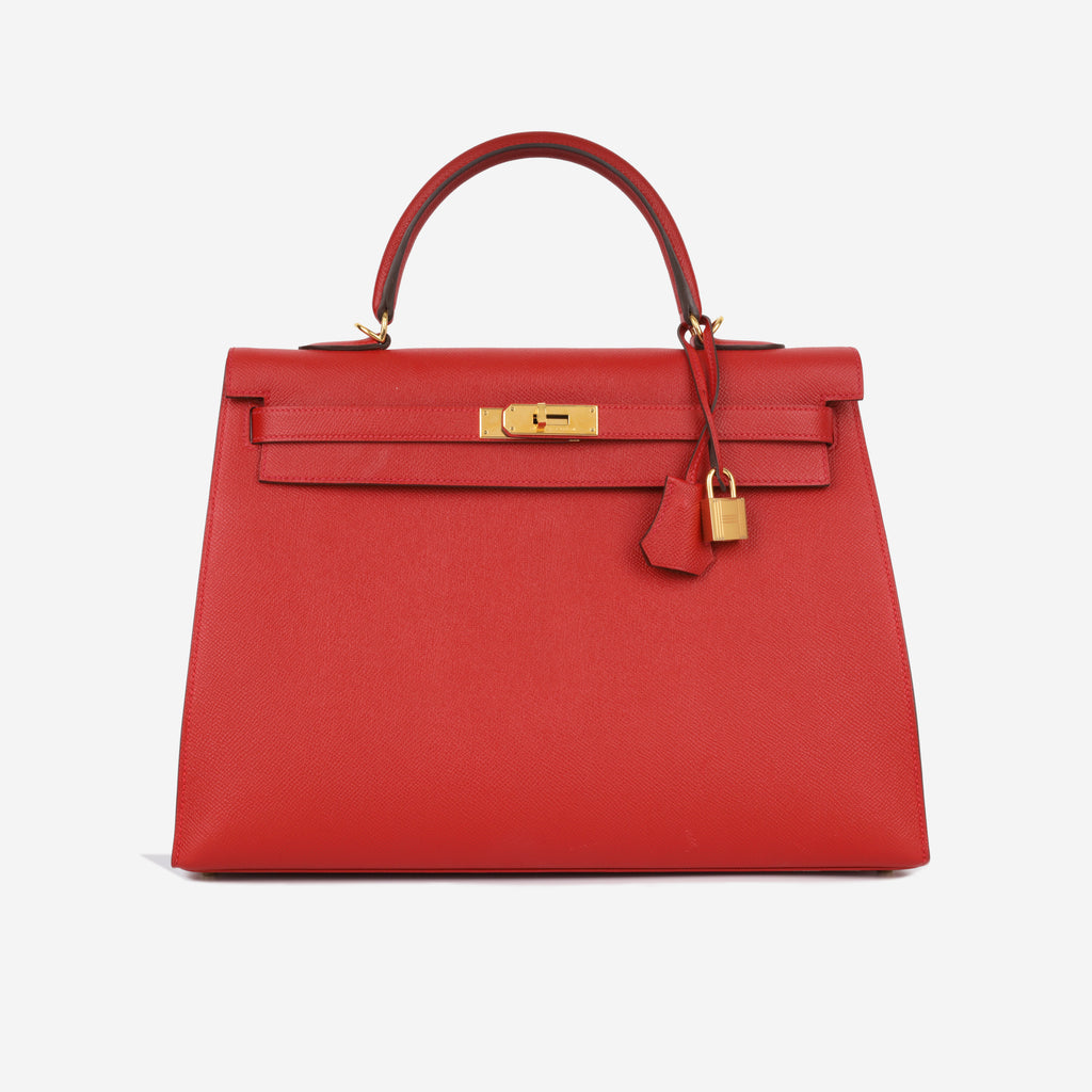 A ROUGE CASAQUE EPSOM LEATHER SELLIER KELLY 25 WITH GOLD HARDWARE