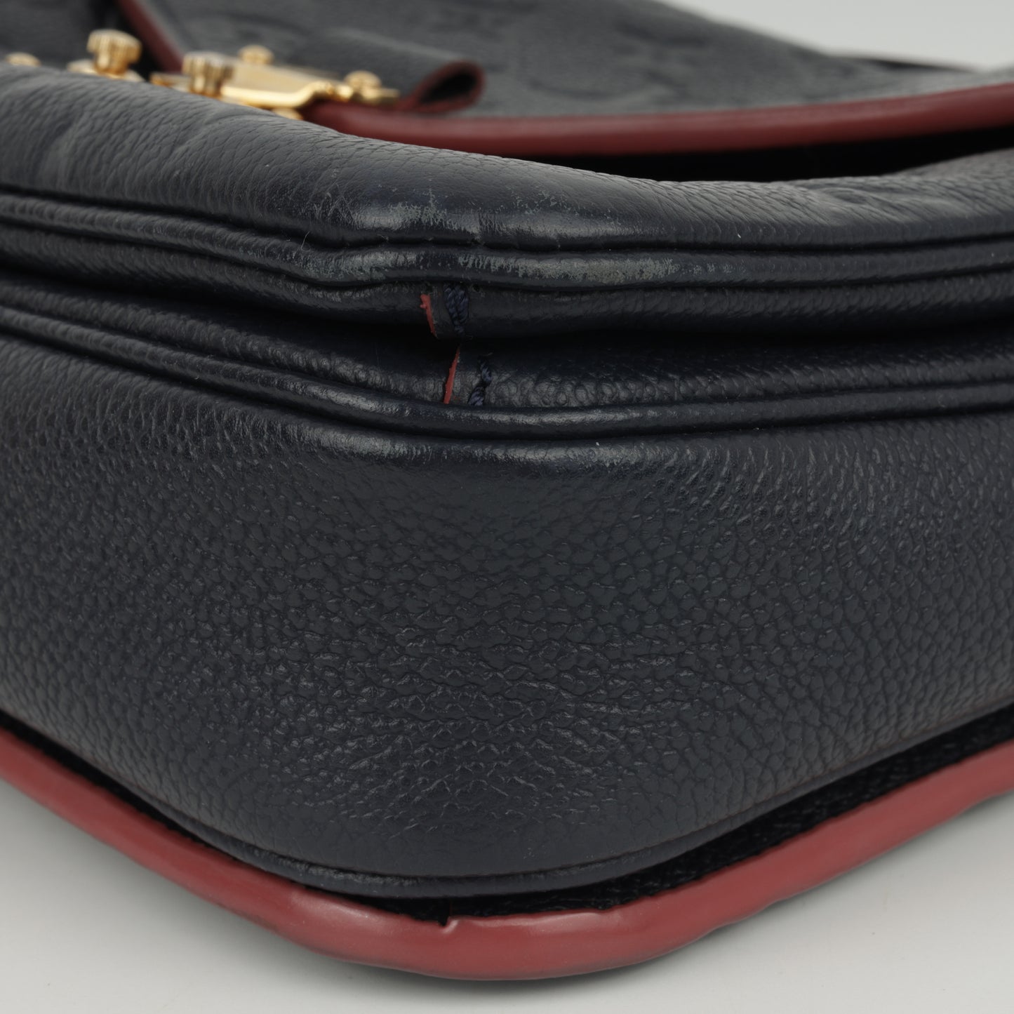 Louis Vuitton Pochette Métis - Navy Empreinte / Red Trim | Gold Hardware