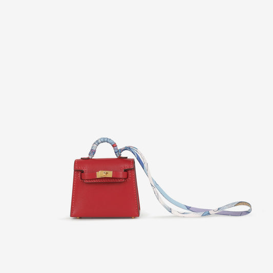 Hermès Kelly Charm - Rouge Vif Tadelakt | Gold Hardware