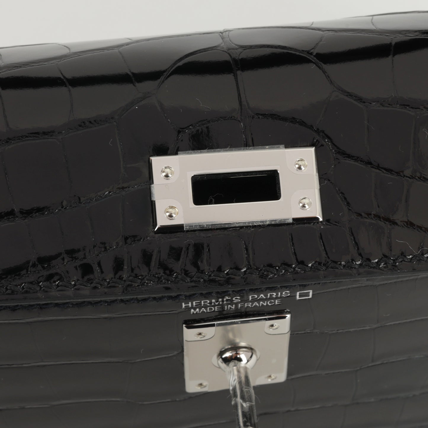 Hermès Mini Kelly - Black Shiny Alligator | Palladium Hardware