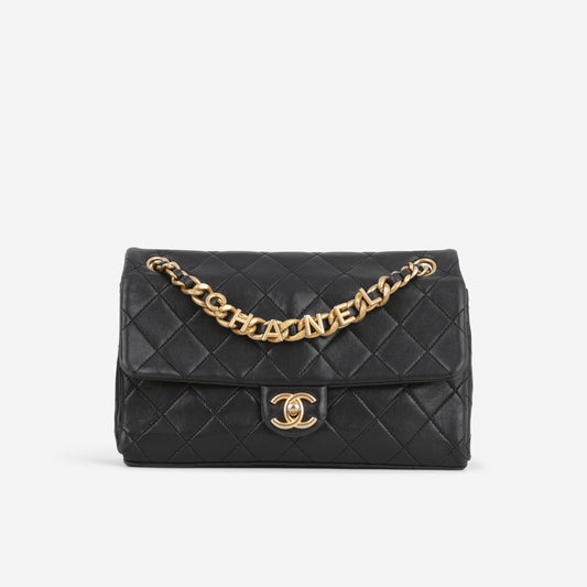 Chanel Logo Chain Flap Bag - Black Lambskin | Aged Gold Hardware