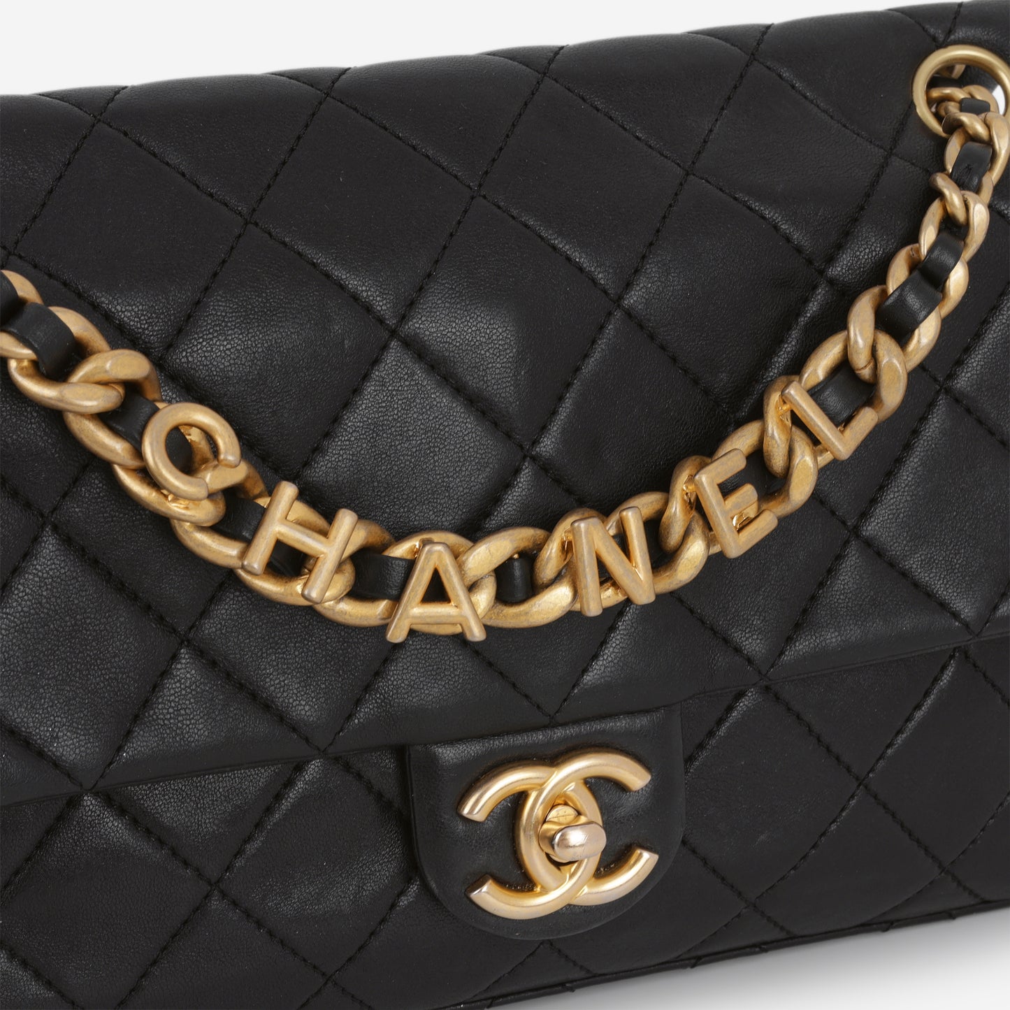 Chanel Logo Chain Flap Bag - Black Lambskin | Aged Gold Hardware