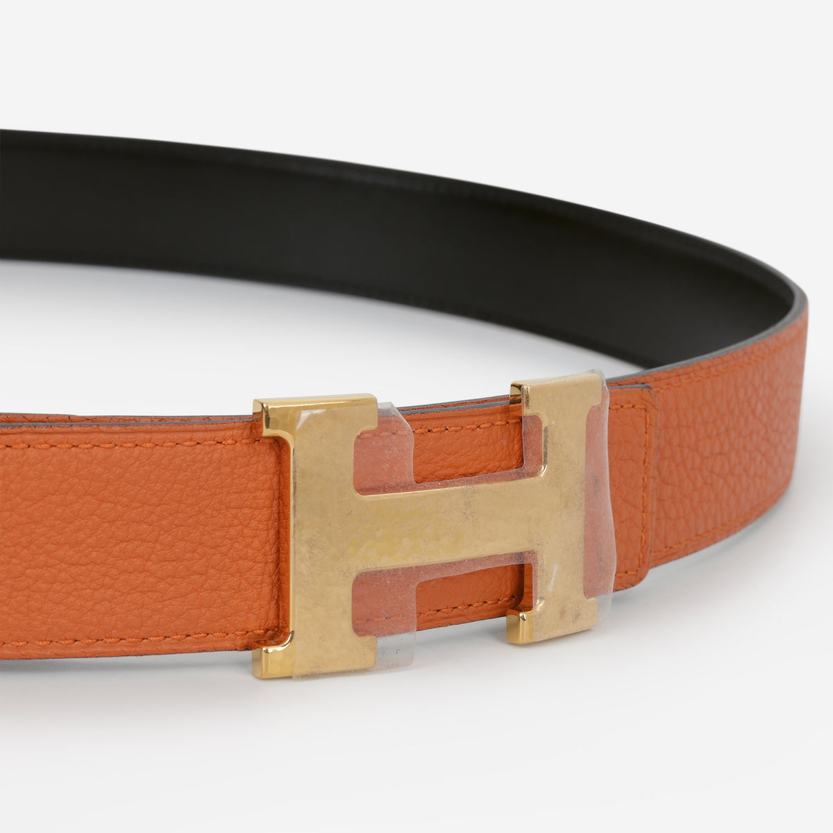 Hermès Constance Belt - Reversible Orange Togo / Noir Box Strap | Gold Hardware