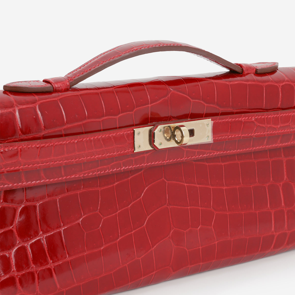 Hermès Kelly Cut - Rouge H Crocodile Niloticus | Permabrass Hardware