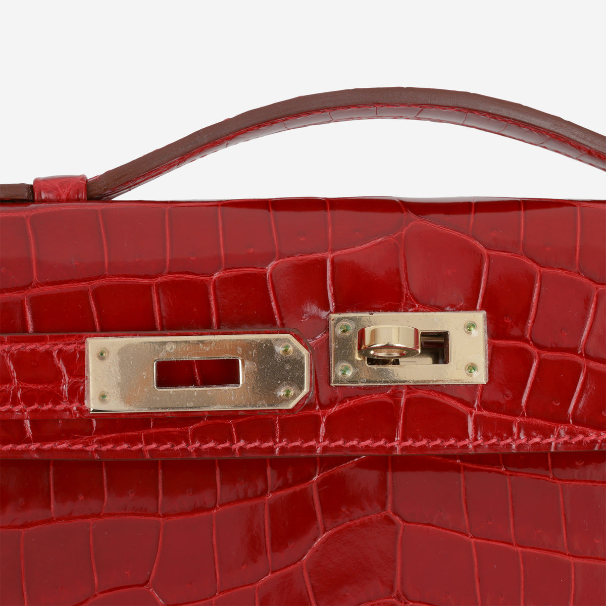 Hermès Kelly Cut - Rouge H Crocodile Niloticus | Permabrass Hardware