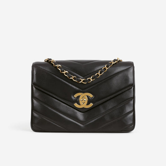 Chanel Vintage Jumbo Chevron Flap - Black Lambskin | Gold Hardware - Bagista